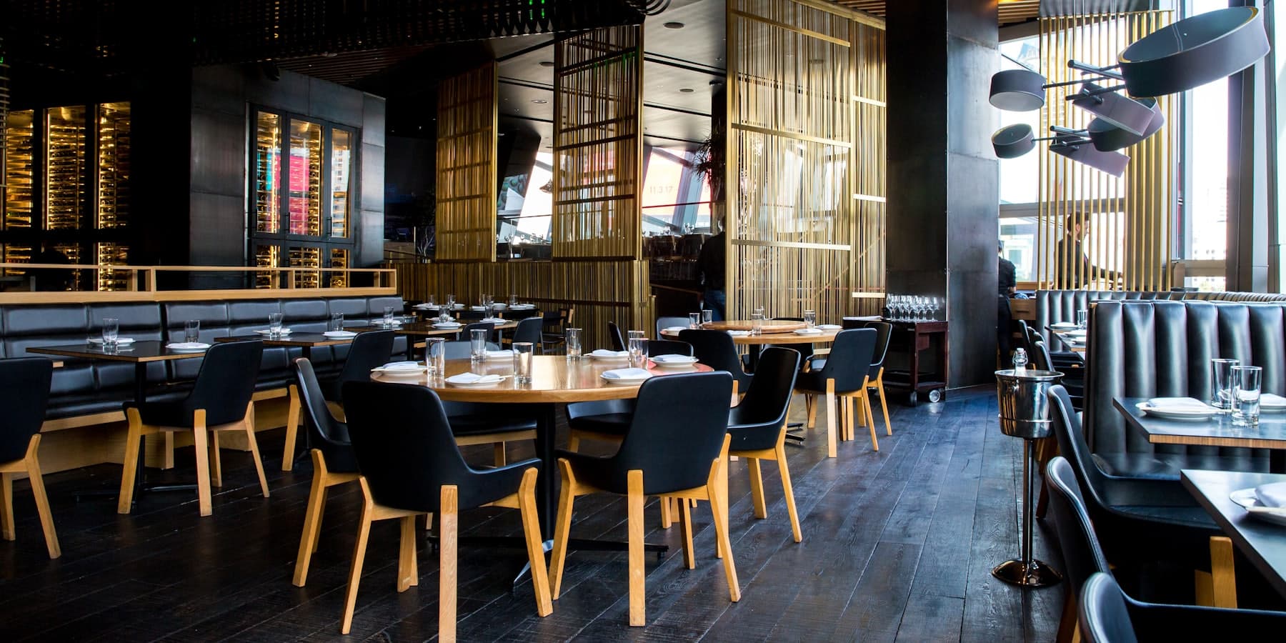 A restaurant kitchen and dining room mid-service