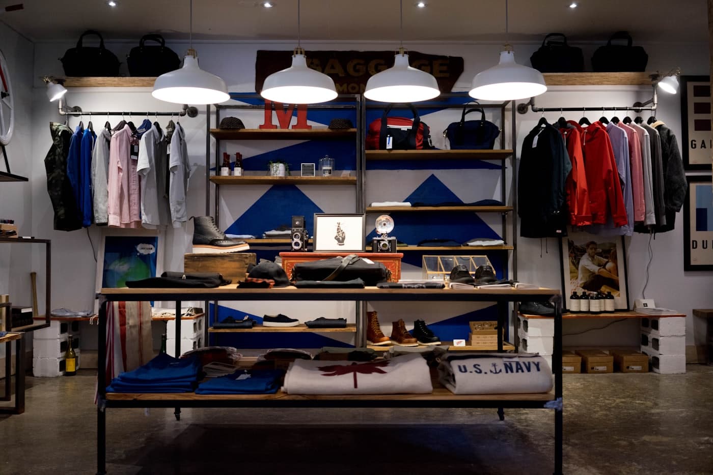 Shop owner standing in a bright retail boutique storefront